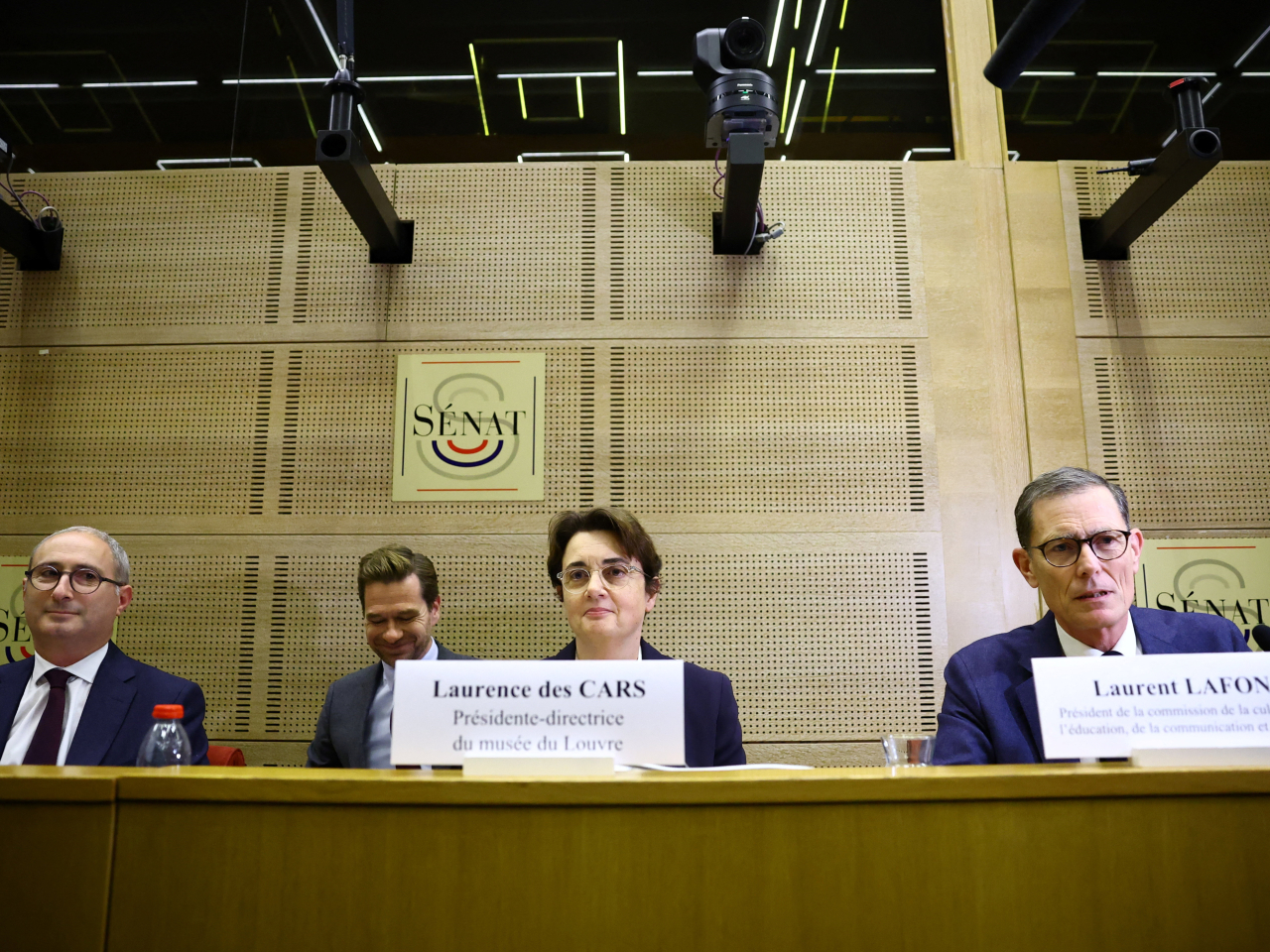 Louvre director Laurence des Cars told a Senate committee blind spots in the museum's security camera system meant the burglars managed to break in through a balcony undetected. Photo: Reuters