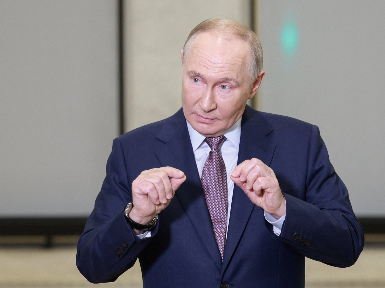 Vladimir Putin said while US sanctions against Russia's two biggest oil companies were an "unfriendly act", they wouldn't significantly affect the Russian economy. Photo: Reuters