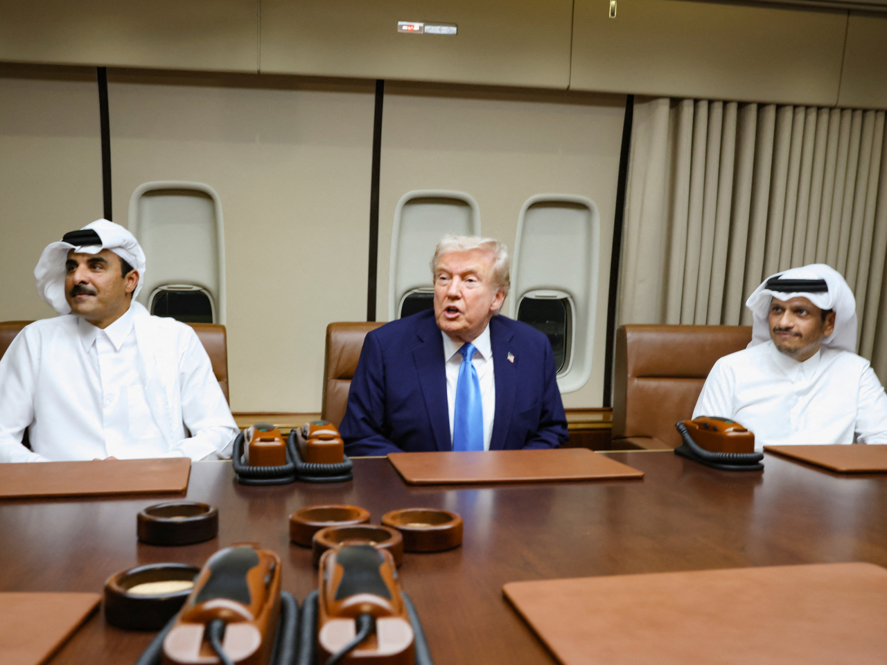 US President Donald Trump meets Qatar leaders on Air Force One. Photo: Reuters