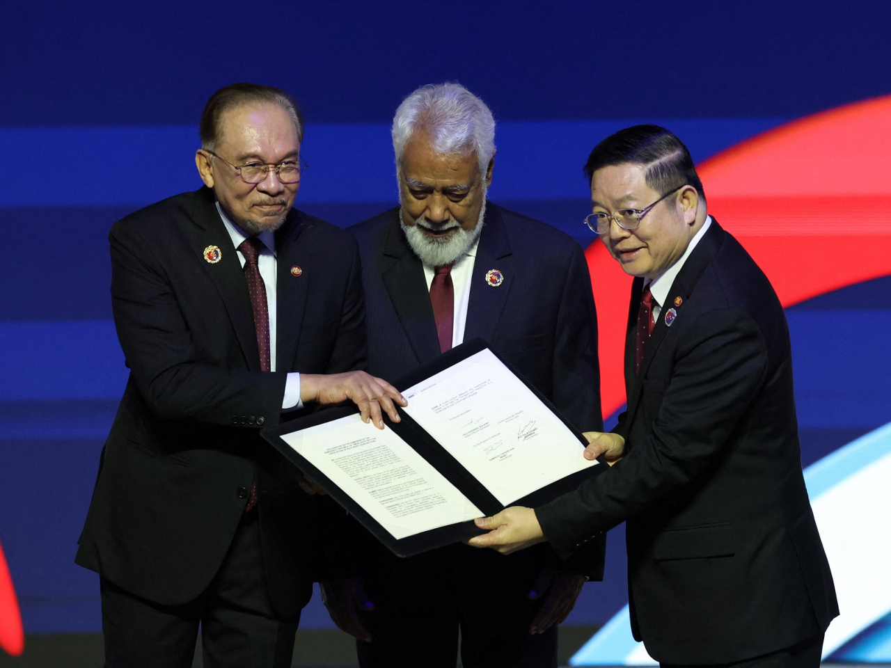 Malaysia's Prime Minister Anwar Ibrahim, East Timor's Prime Minister Kay Rala Xanana Gusmao and Premier Li Qiang (left to right) pose during the signing ceremony of the declaration on the admission of the Democratic Republic Of Timor-Leste into Asean. Photo: Reuters