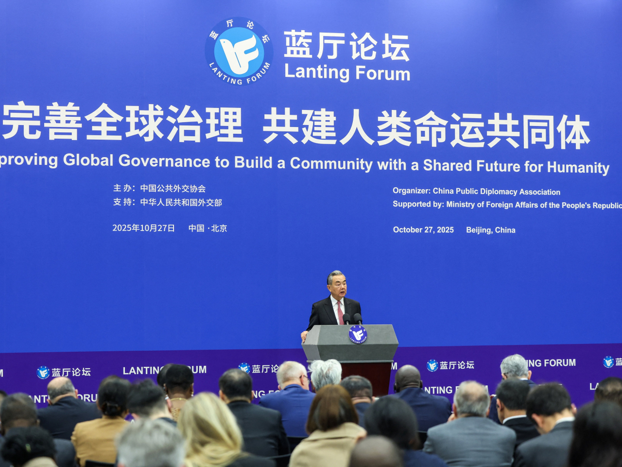 Wang Yi says a world entangled in chaos needs stronger global governance more than ever. Photo: Reuters