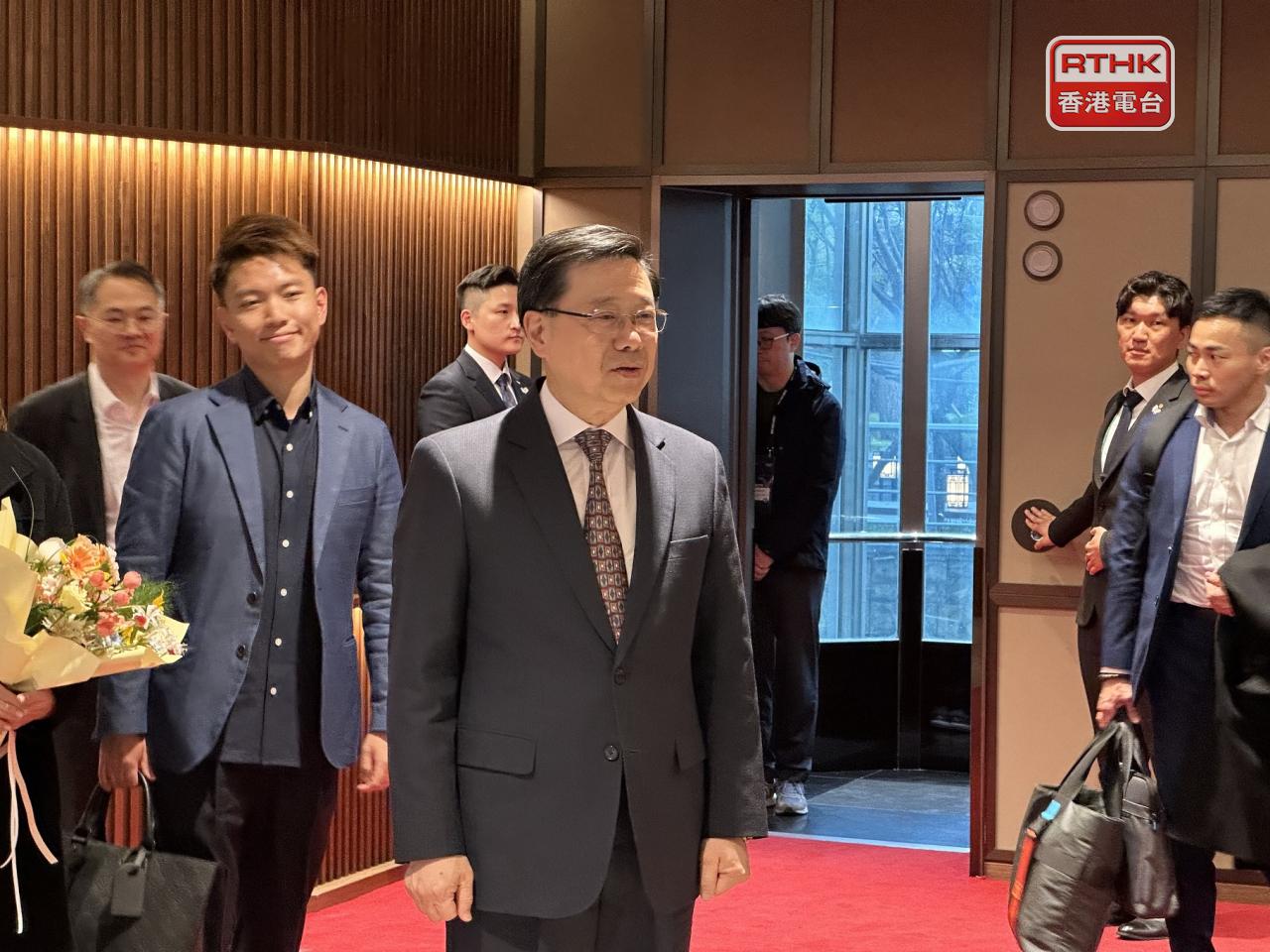 Chief Executive John Lee arrives in a hotel in Gyeongju where he's staying. Photo: RTHK