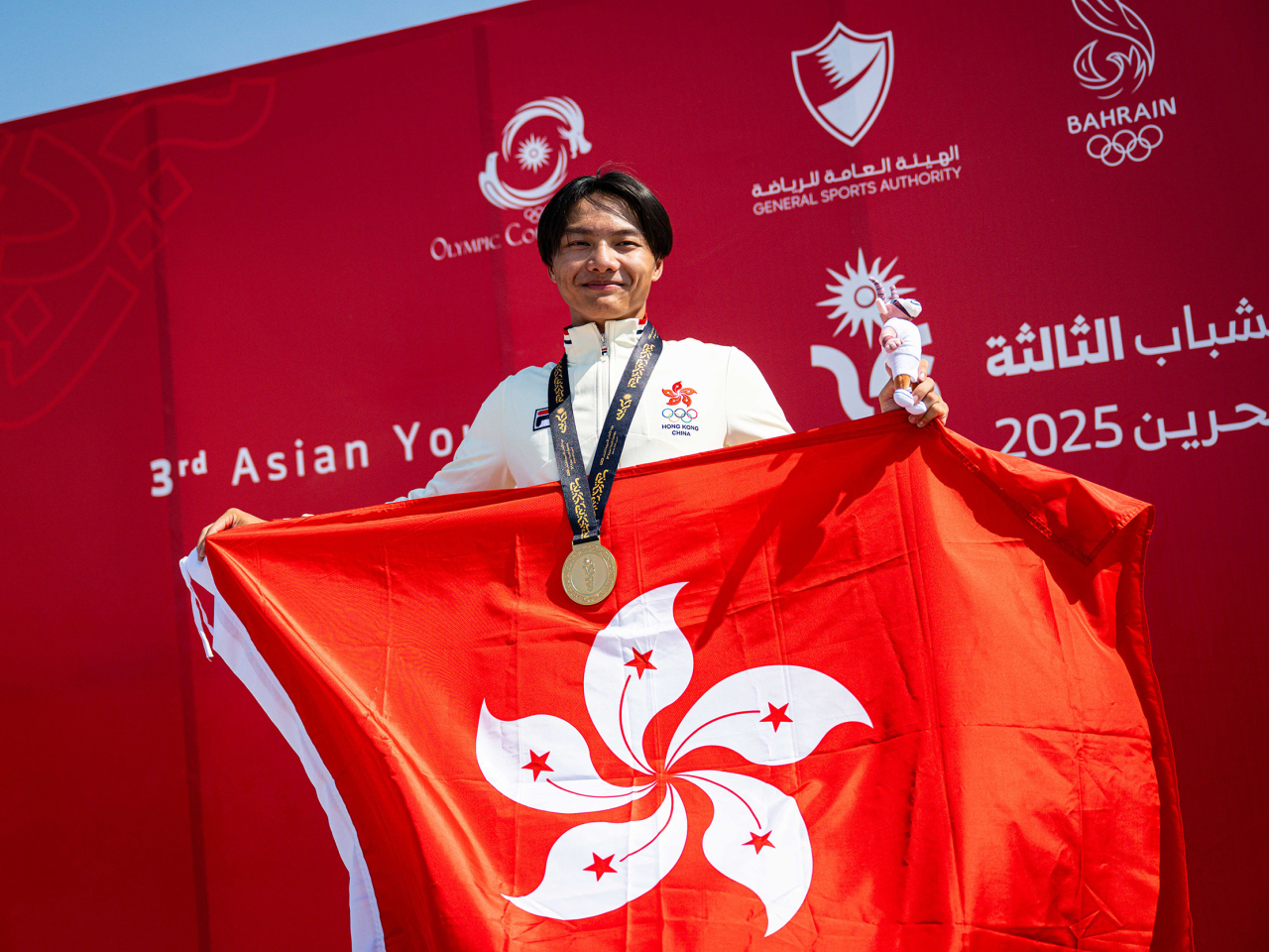 李昀俊在男子個人公路賽,為港團取得今屆第8面金牌。(港協暨奧委會提供)