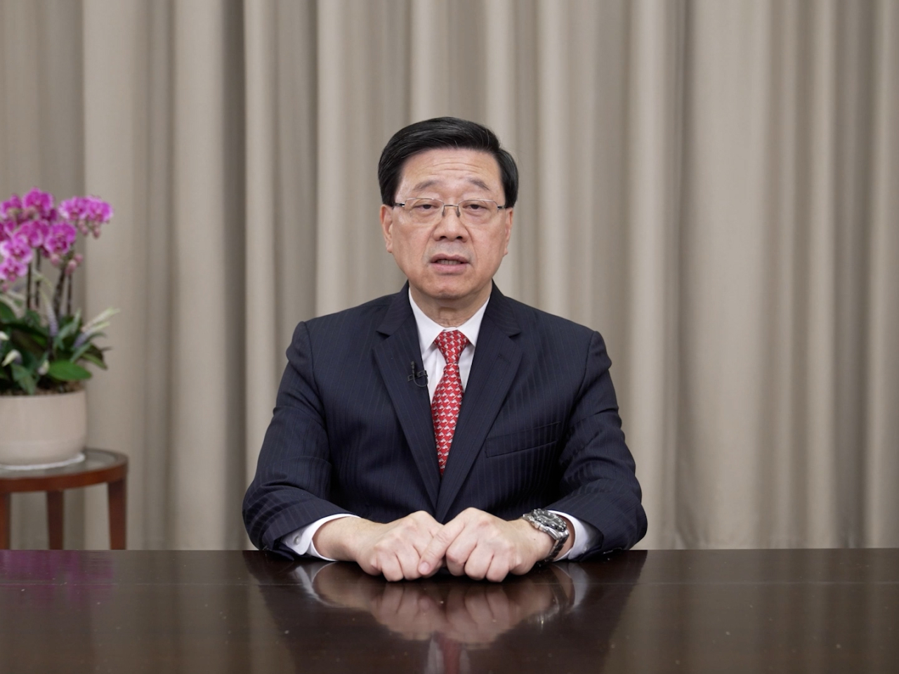 李家超表示,金融是現代經濟的核心,唯有持續創新、主動變革、勇於重塑,才能在變局中開創新局。(政府新聞處)