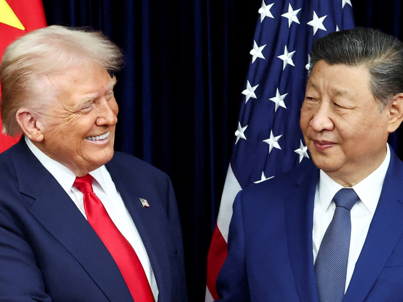 習近平與特朗普在南韓釜山會面。(路透社)