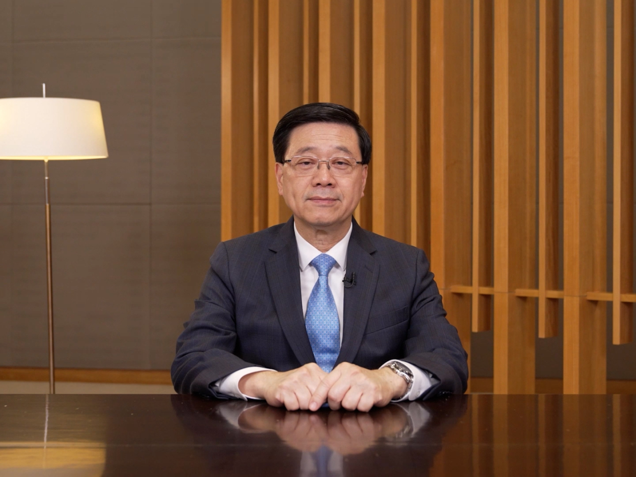 李家超在一個有關大灣區論壇視像致辭。(政府新聞處)