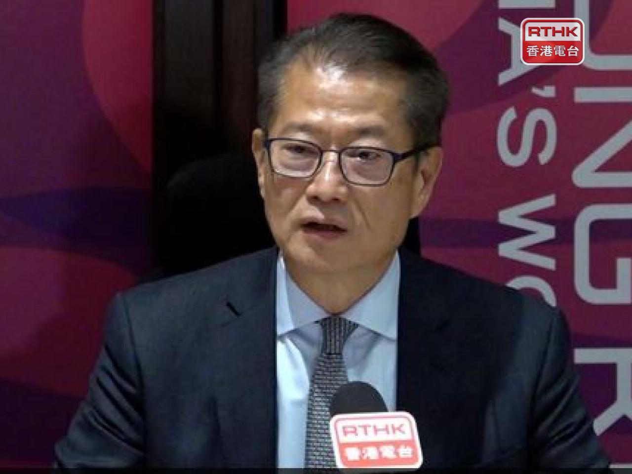 Paul Chan says the latest interest rate cuts by banks will alleviate repayment pressure on mortgages and business loans. Photo: RTHK