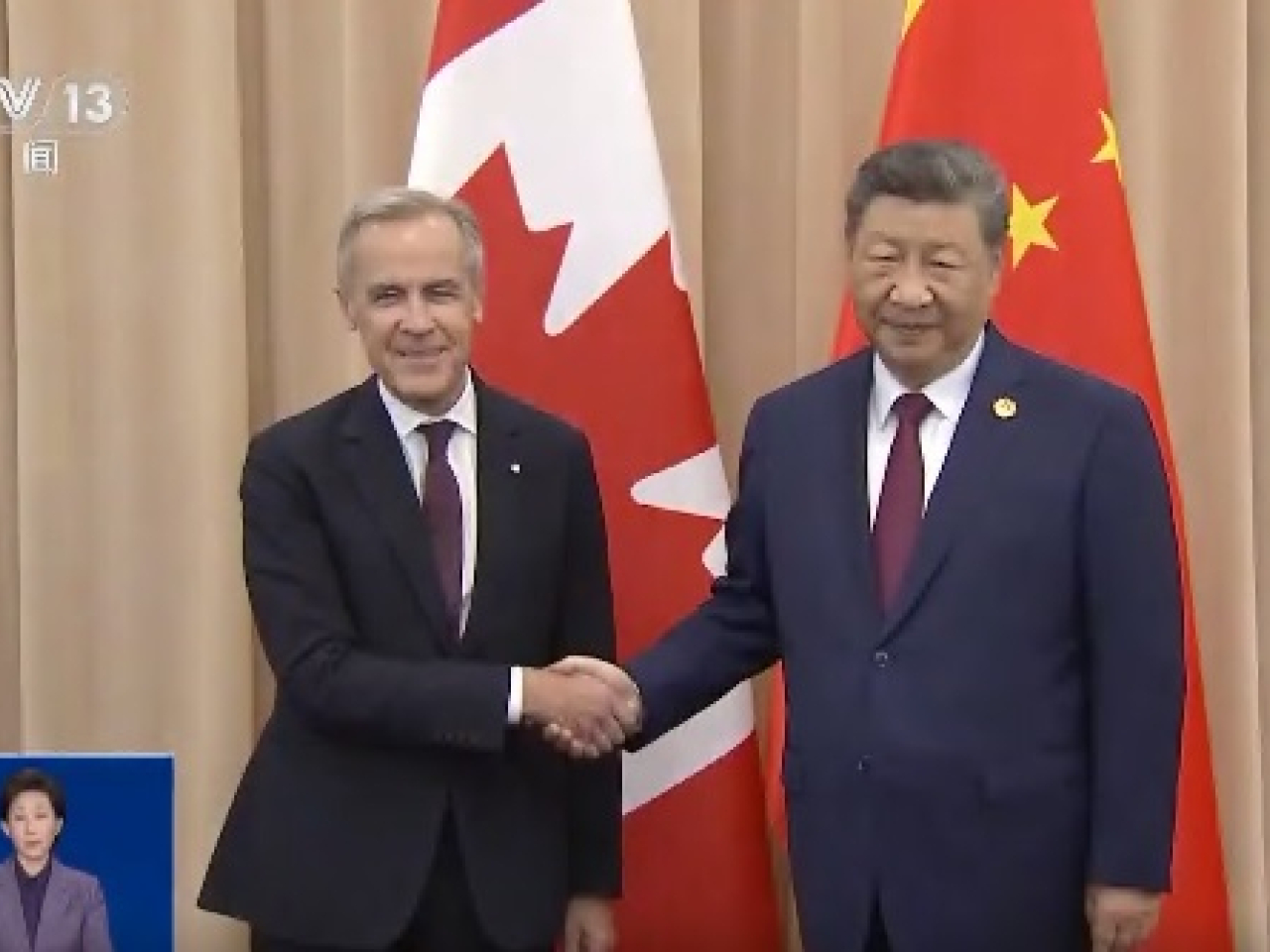 國家主席習近平在南韓慶州出席亞太經合組織領導人非正式會議期間,與加拿大總理卡尼會晤。(央視新聞截圖)