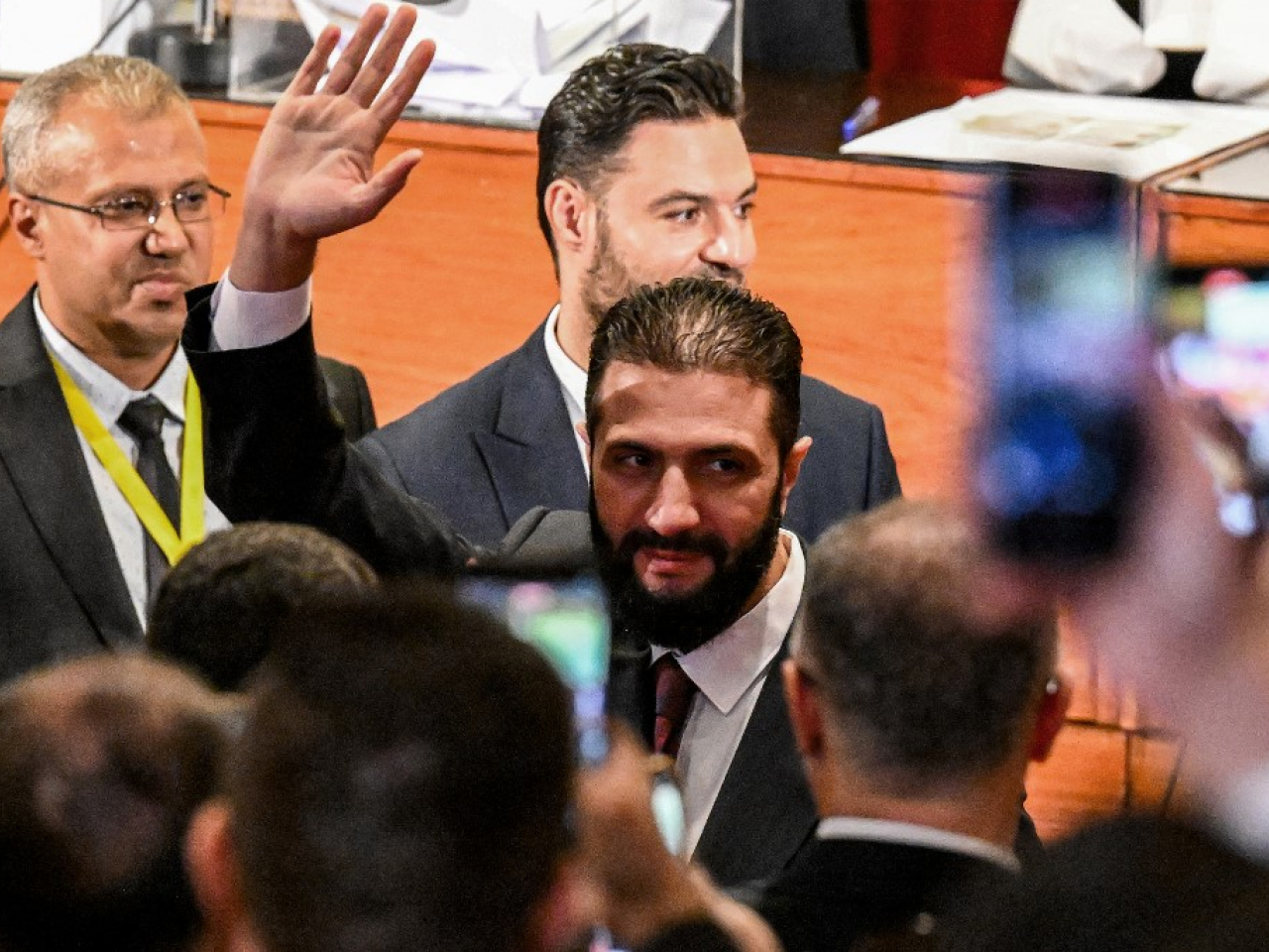 Syria's interim President Ahmed al-Sharaa visits a polling station where members of Syrian local committees have been casting their votes to designate an interim parliament. Photo: AFP