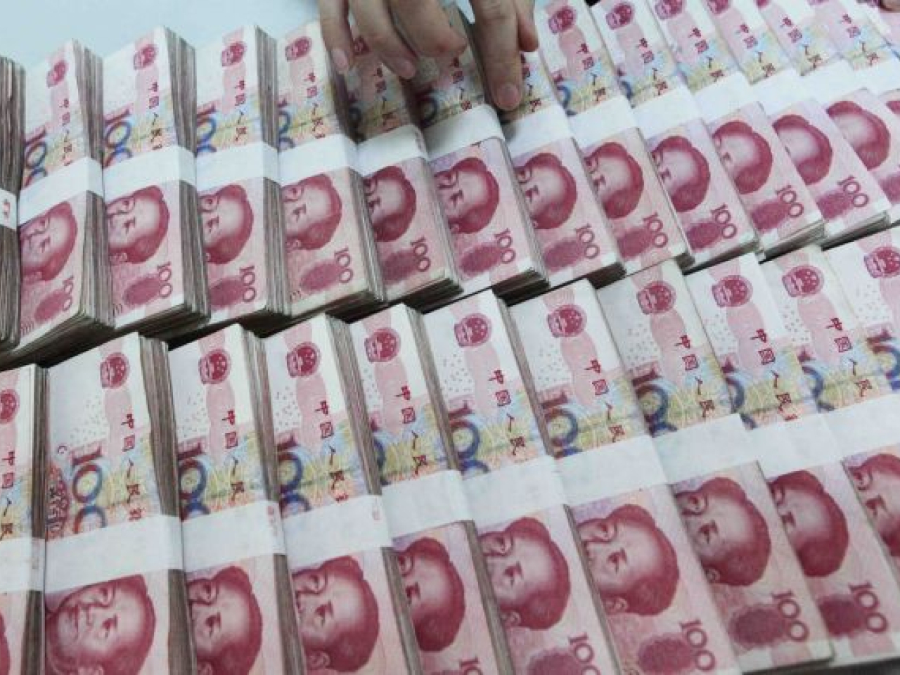 人行明日開展7000億元人民幣買斷式逆回購操作，期限3個月，保持銀行體系流動性充裕。（新華社資料圖片）