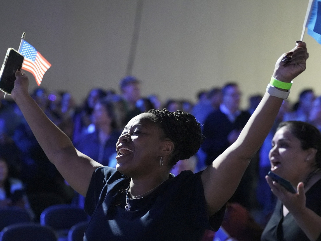 A woman celebrates, as Democrat Abigail Spanberger is projected to win in Virginia's race for governor, at the Richmond Convention Center in Richmond, Virginia. Photo: Reuters