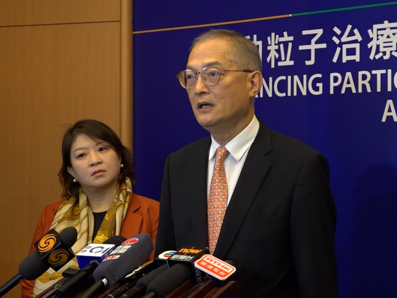 Health Secretary Lo Chung-mau says the storage fee is aimed at ensuring better use of resources as Hospital Authority chief Libby Lee looks on. Photo: RTHK