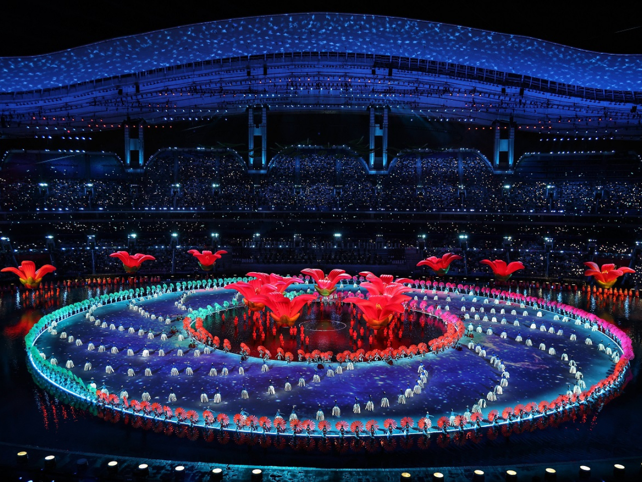 彭高峰說開幕式充分體現全國人民包括港澳同胞的愛國熱情，弘揚體育精神。（新華社）