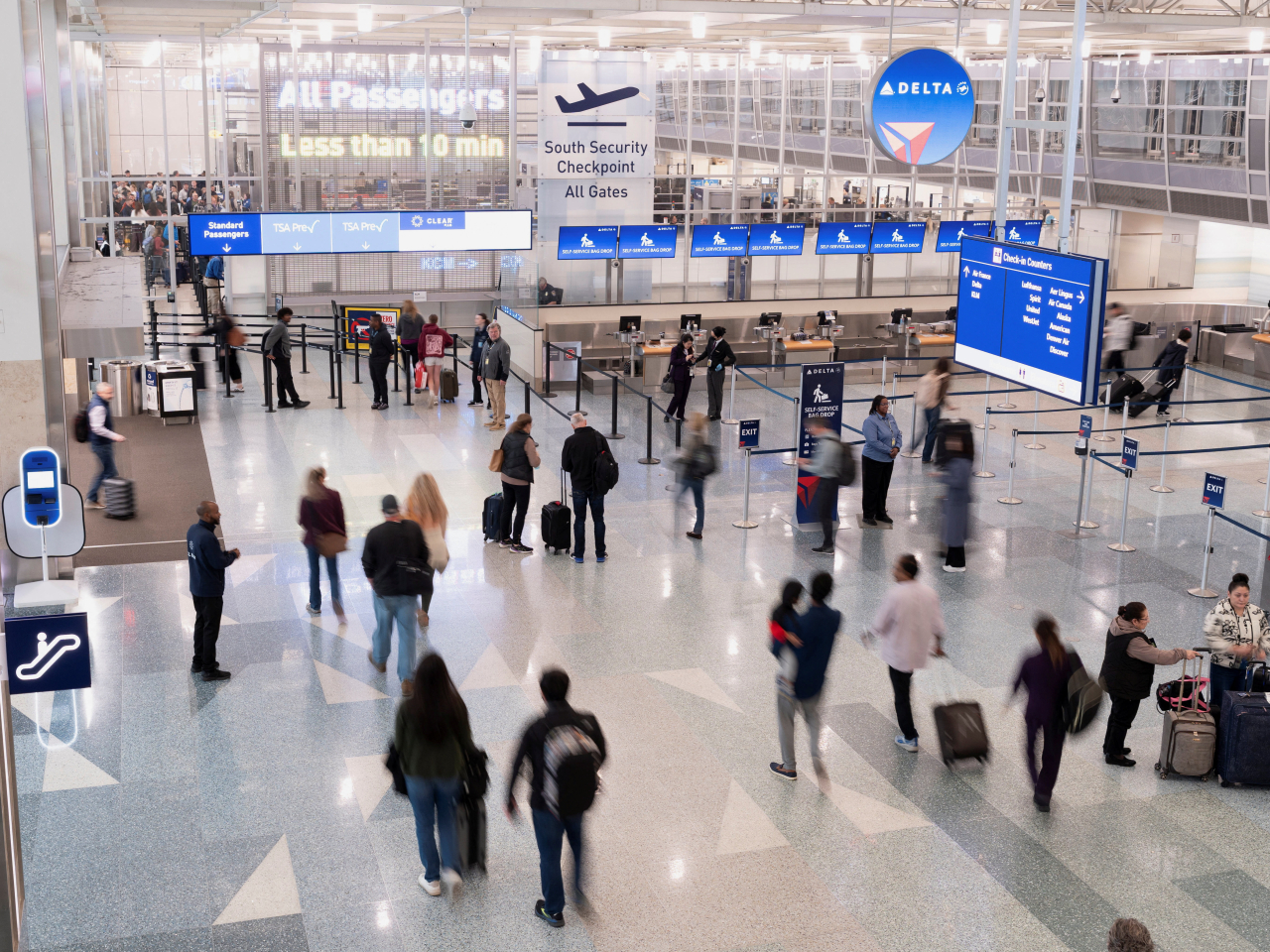 Travellers trickle though Minneapolis-Saint Paul International Airport amid fears the shutdown may keep families apart during Thanksgiving later this month. Photo: Reuters