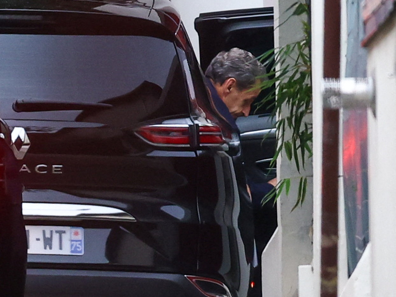 Nicolas Sarkozy returned home after a Paris court granted him an early release from jail, pending an appeal, weeks after he started a five-year sentence. Photo: Reuters