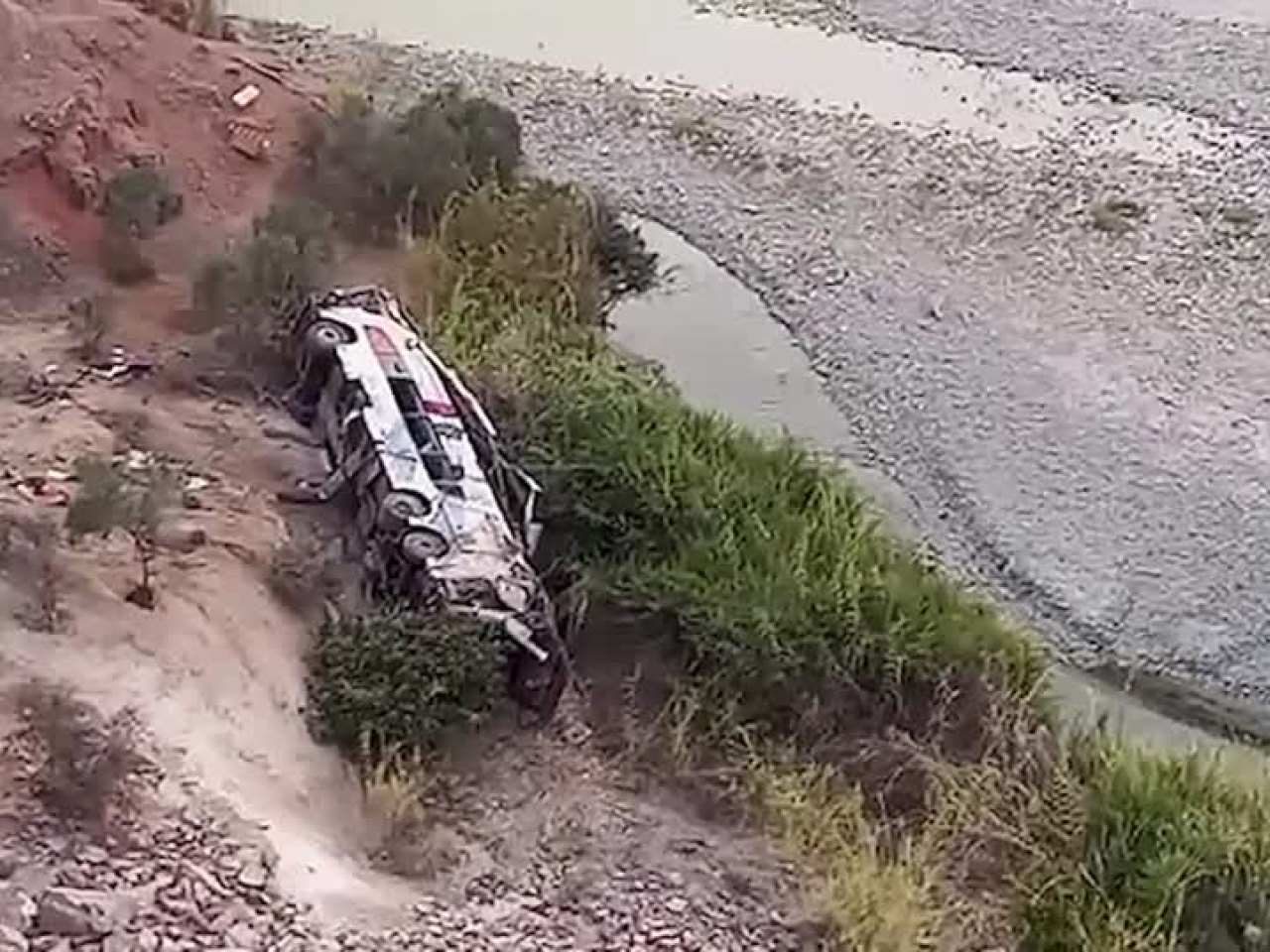 The bus fell into a ravine approximately 200 metres deep after colliding head-on with a pick-up truck on a bend. Photo: Reuters