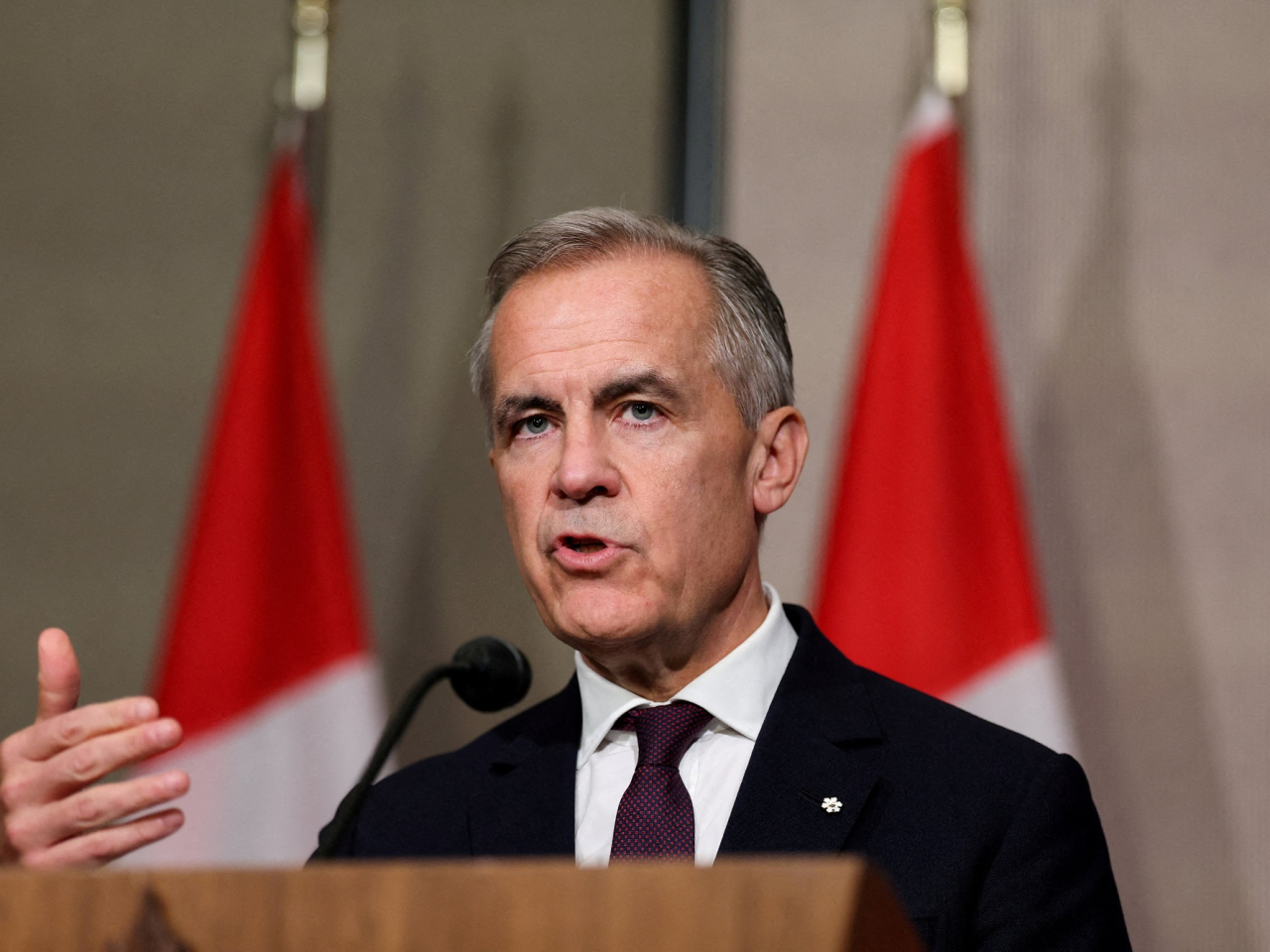 卡尼說加拿大政府將透過改革運作方式等新計劃，推動經濟增長。 （路透社資料圖片）