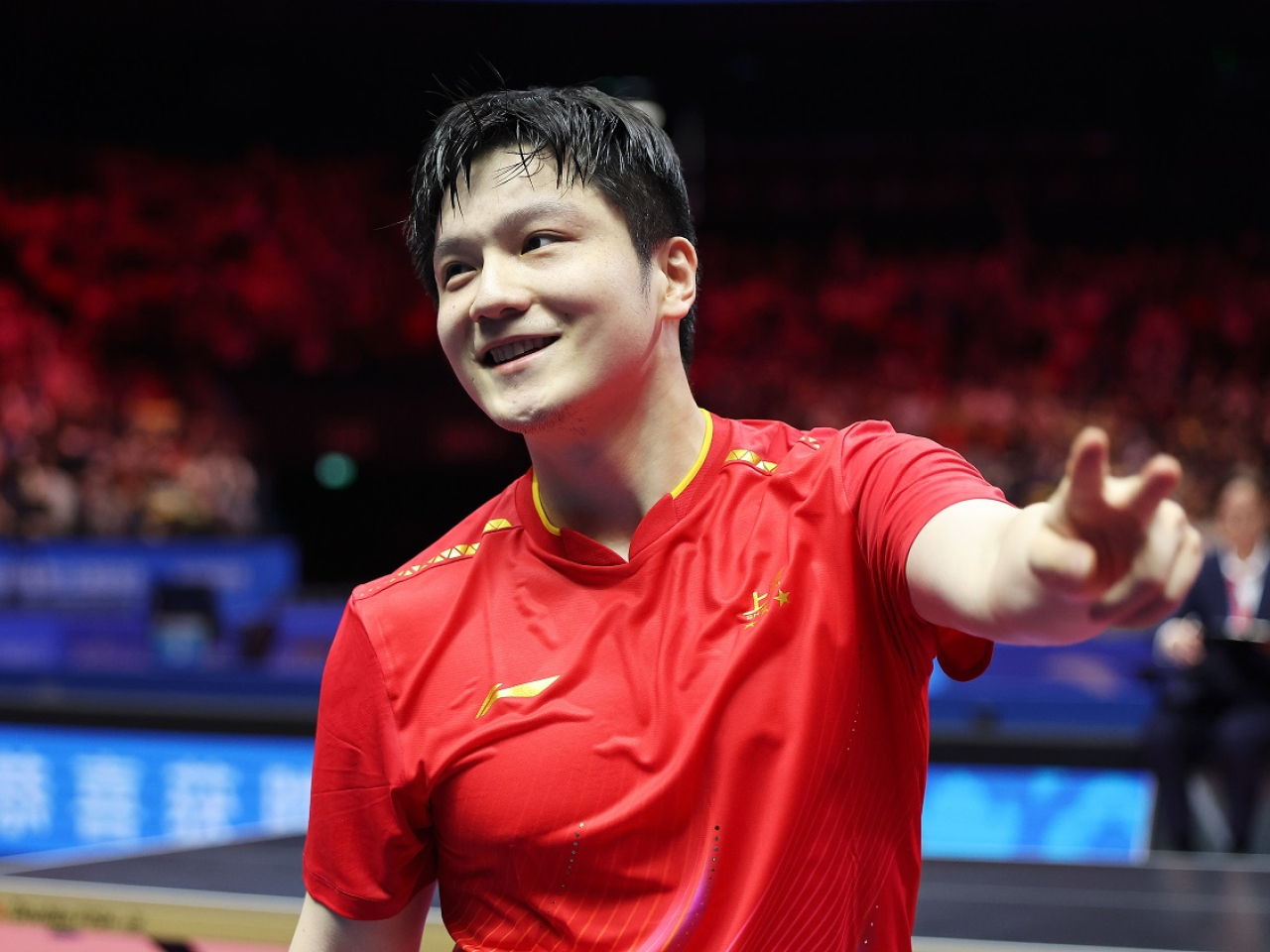 樊振東擊敗海南代表林詩棟，連續兩屆全運會乒乓男單項目奪金。（新華社）