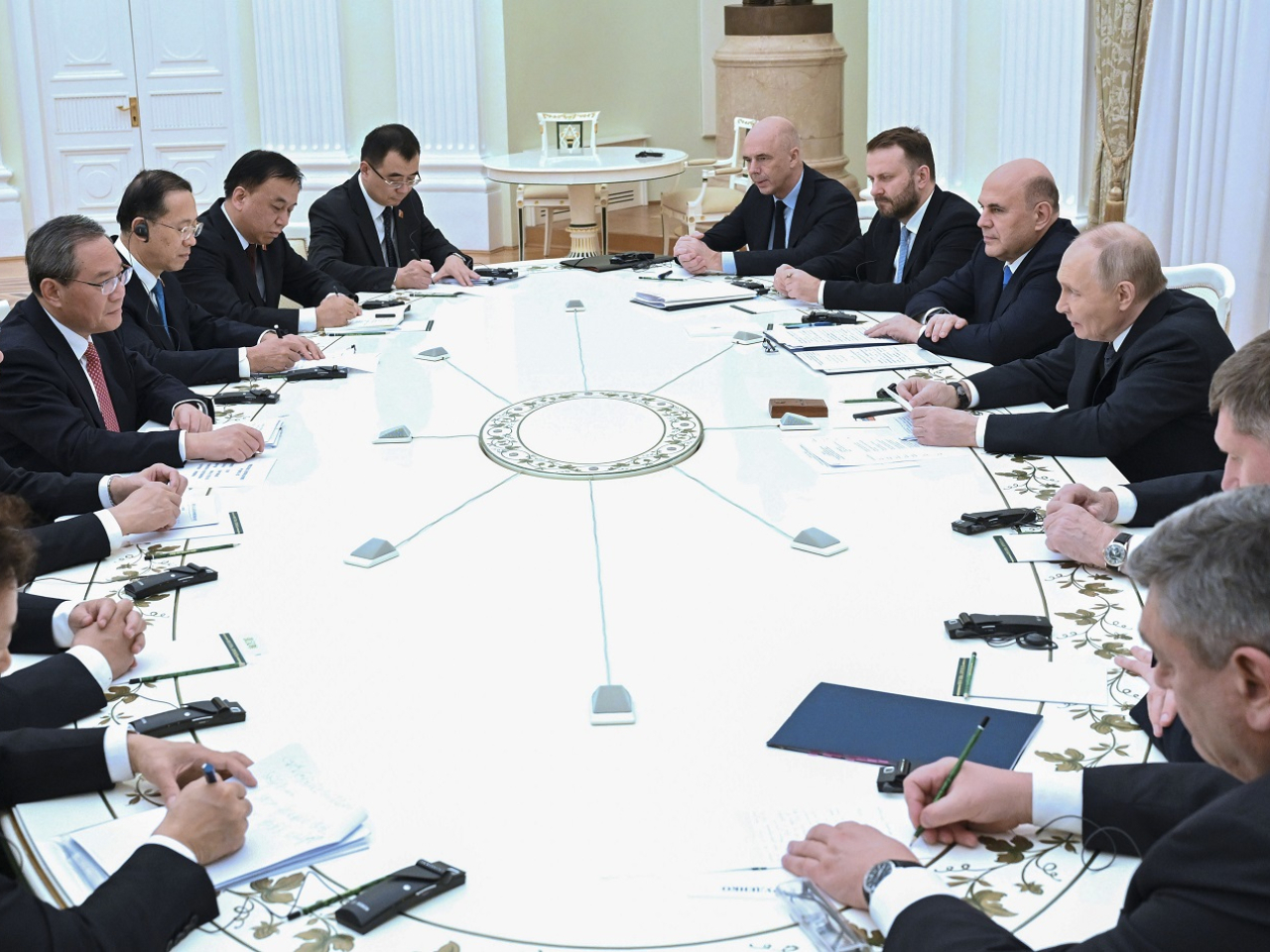 Premier Li Qiang told President Putin during talks at the Kremlin that China stands ready to work with Russian to enhance alignment of development strategies and deepen cooperation in various fields. Photo: Xinhua
