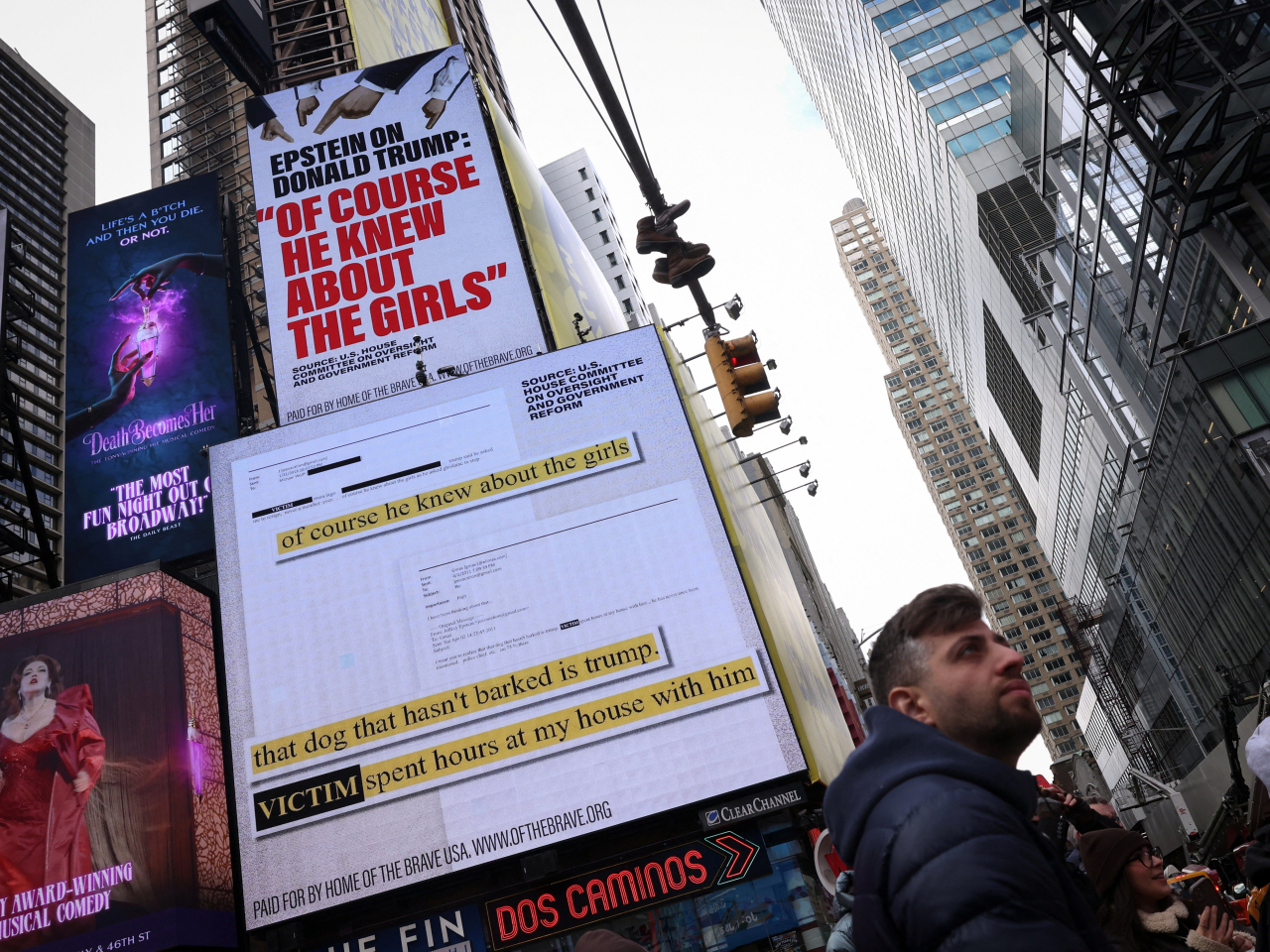 Advertisements in Times Square, New York, placed by the group 'Home of the Brave' disseminate comments Jeffrey Epstein made about Donald Trump. Photo: Reuters