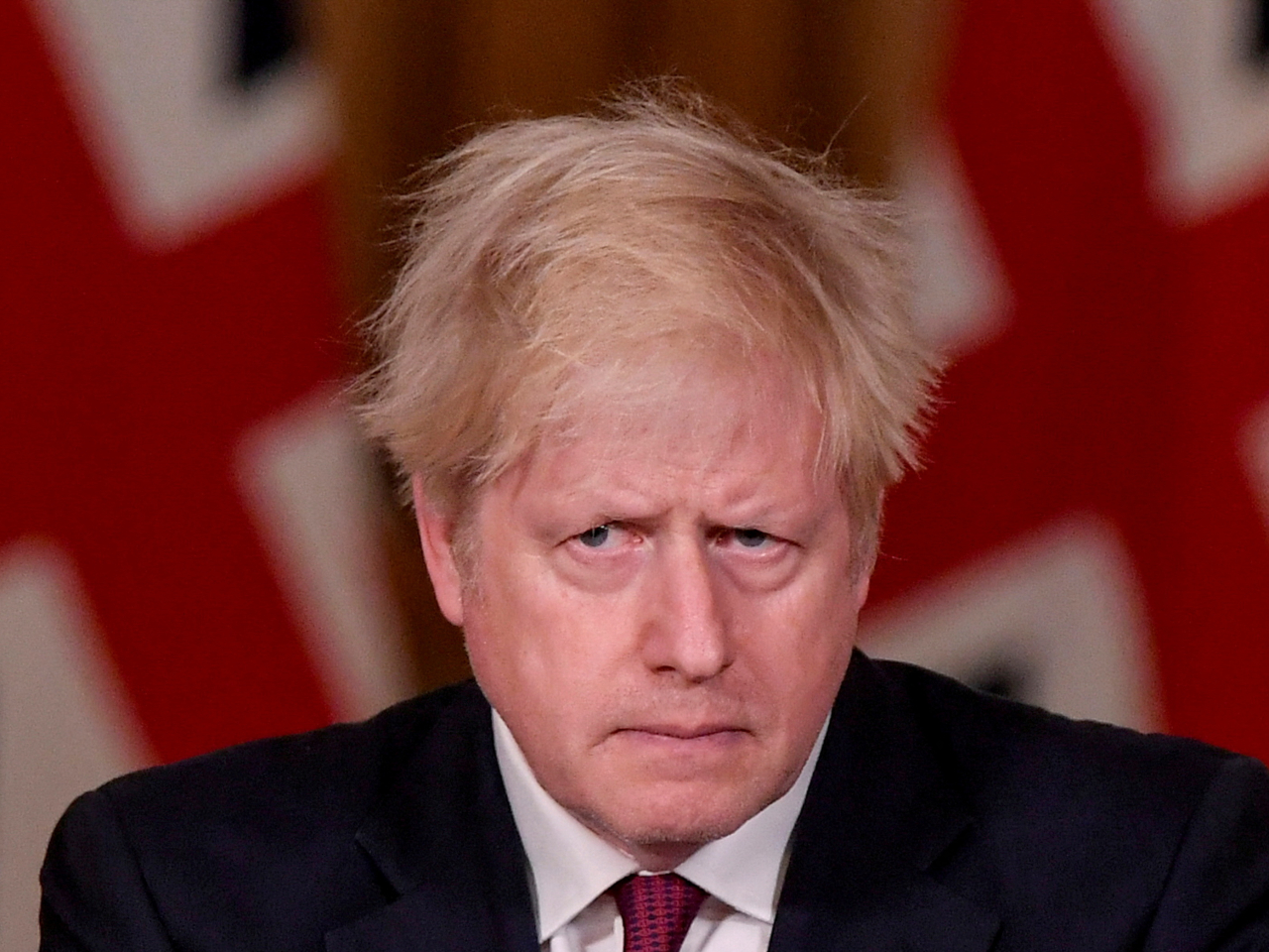 報告指出，約翰遜在2020年初病毒出現時，未能充分意識嚴重性。（路透社資料圖片）