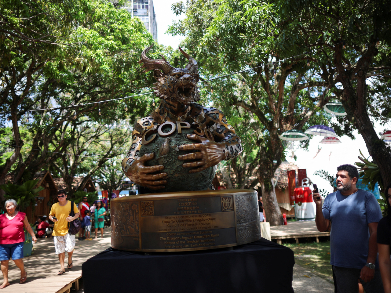 A bronze sculpture 'Guardian Spirit Dragon-Jaguar' by artist Huang Jian guards a square near the COP30 conference site in Belem. Photo: Reuters