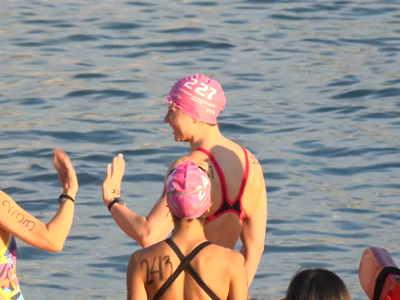 Siobhan Haughey greets a fellow participant ahead of her Harbour Race debut. Photo: RTHK