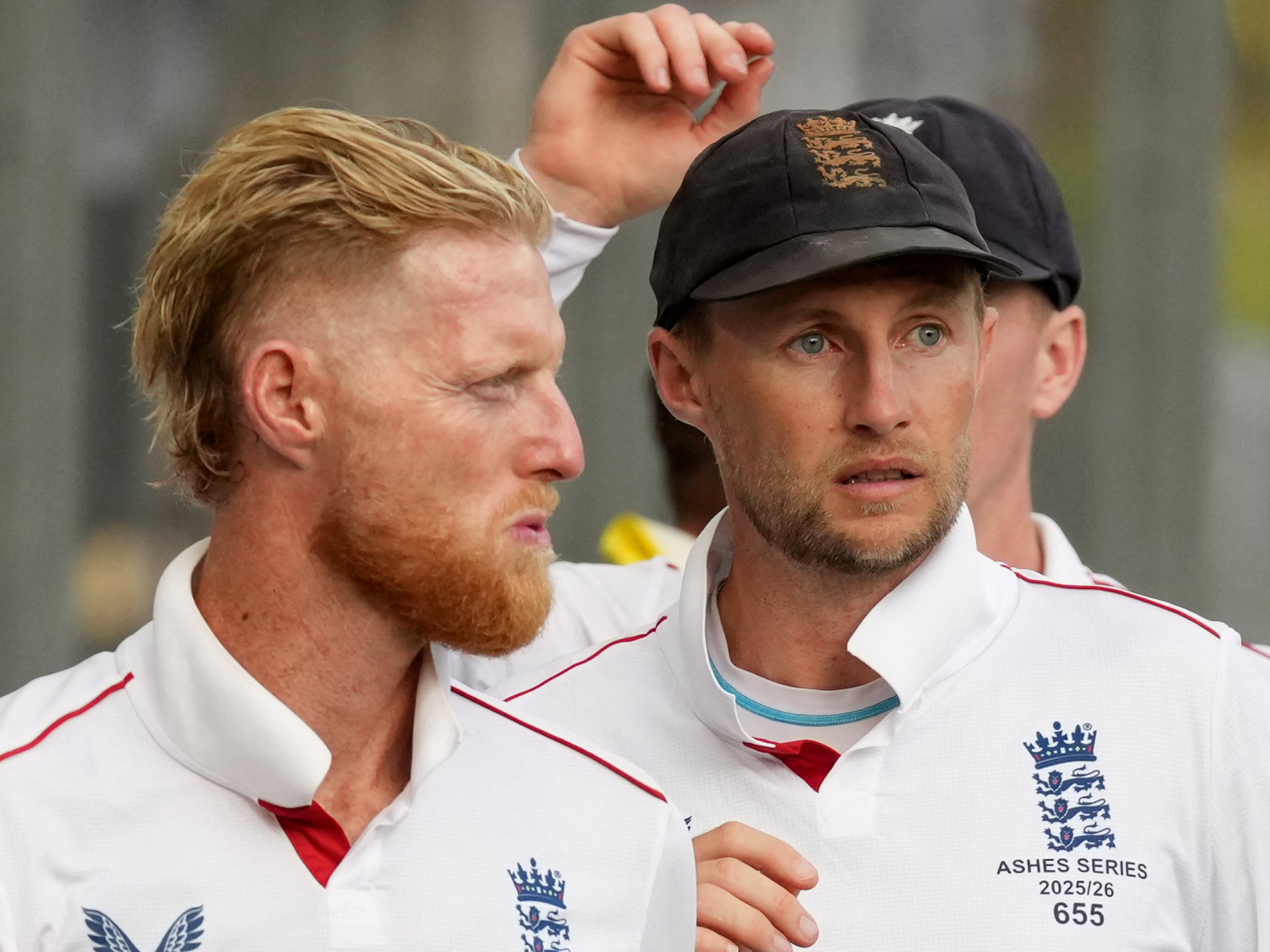 England's Ben Stokes and Joe Root look dejected after their crushing defeat to Australia in the first Test. Photo: Reuters