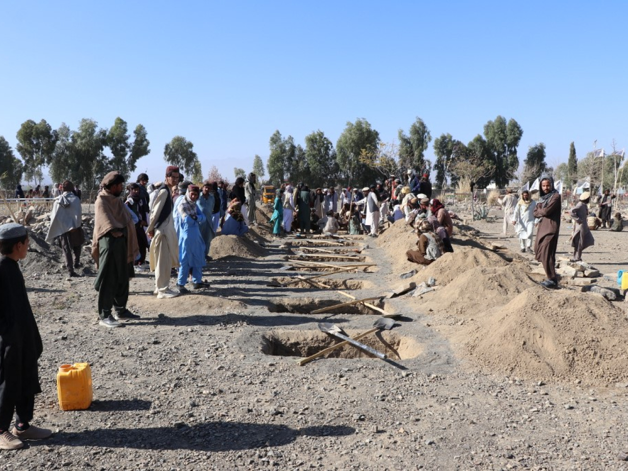 Graves are prepared for the 10 victims in Jige Mughalgai in Khost province. Photo: AFP