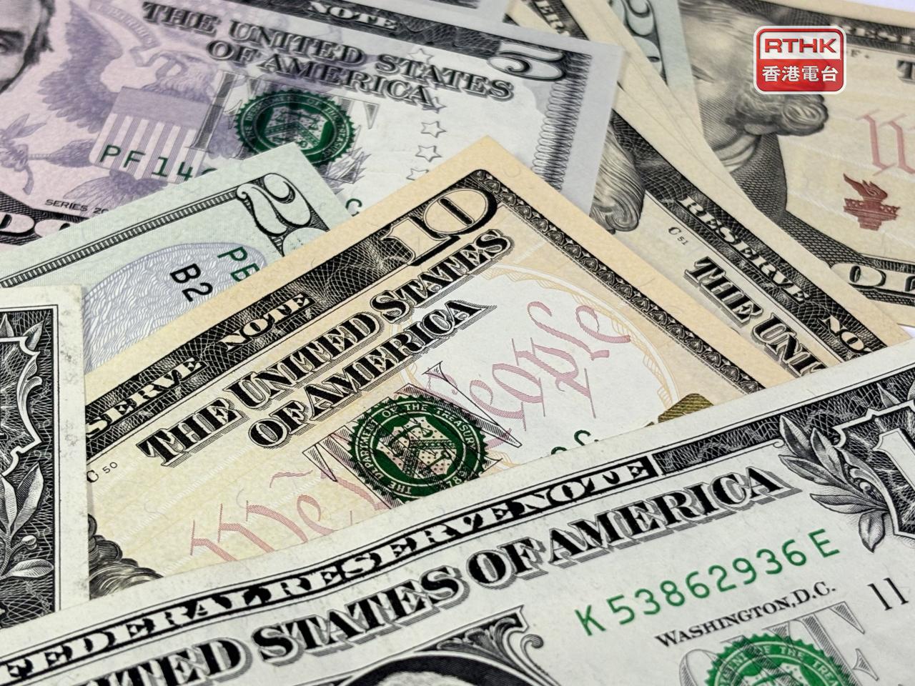 美元指數跌穿100水平，是近1星期以來首次，低見99.655。（港台圖片）