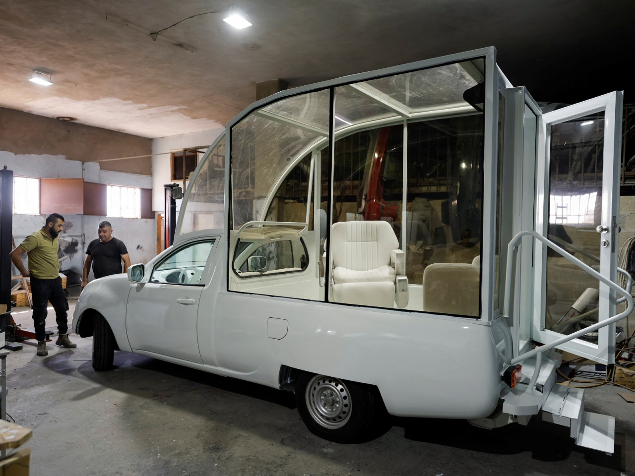Children being treated in the converted popemobile will sit in the pontiff's chair while being attended to. Photo: Reuters