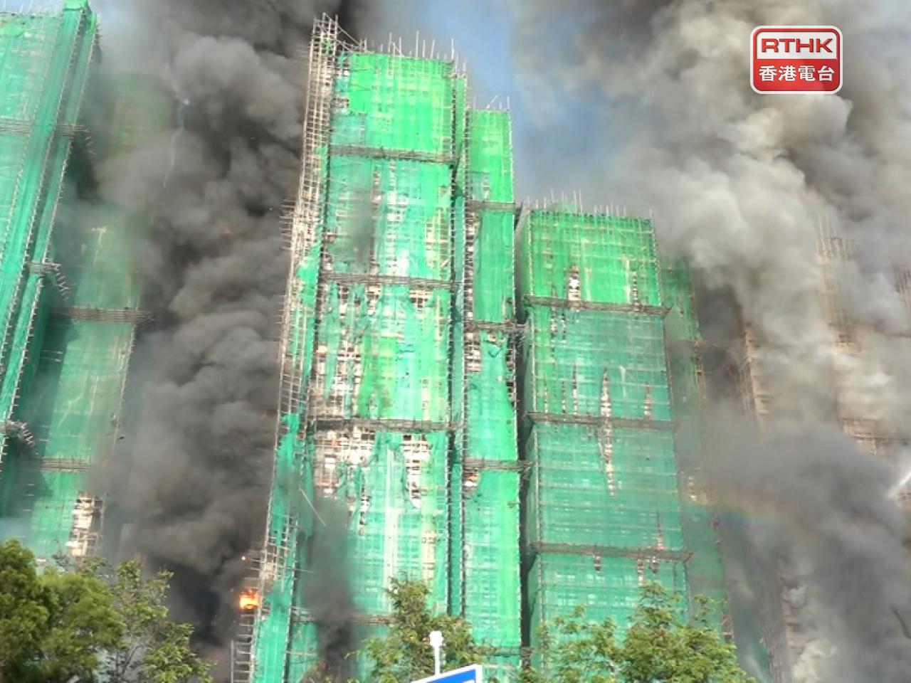 A number of blocks were on fire at the housing estate in Tai Po. Photo: RTHK