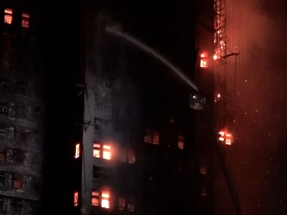 John Lee says while holding the election is important work, the government&#039;s priority now is to tackle the blaze. Photo: RTHK