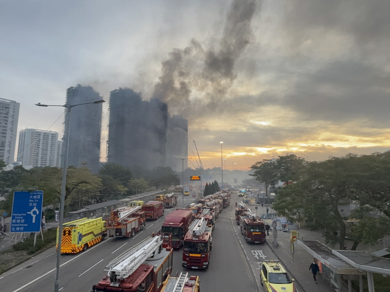 Firefighters say the blaze has been contained at four of the seven burning buildings at Wang Fuk Court in Tai Po. Photo: RTHK