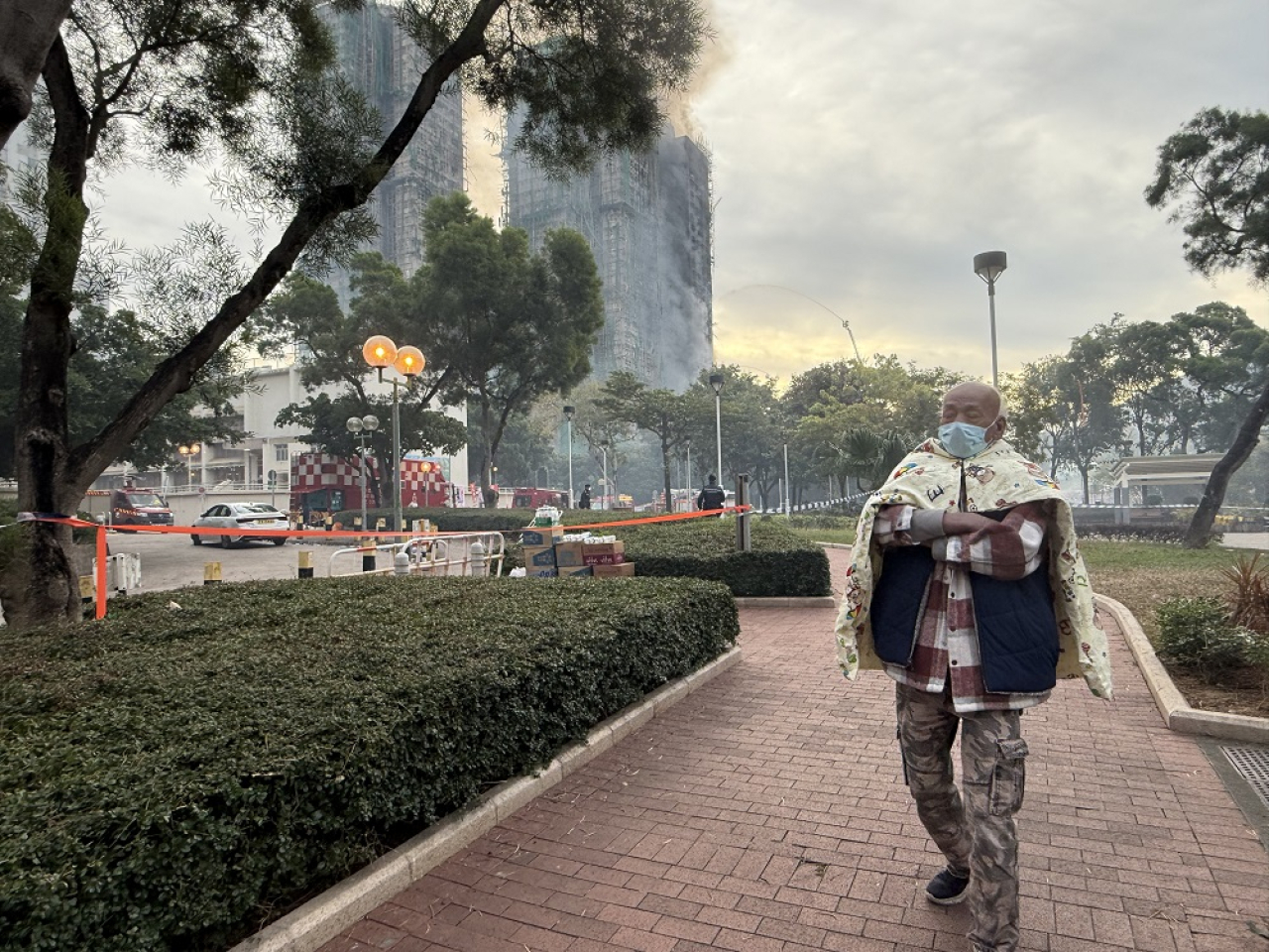 Longtime Wang Fuk Court resident Mr Sze struggled to hold in his emotions as he spoke of his wish to return home as soon as possible. Photo: RTHK
