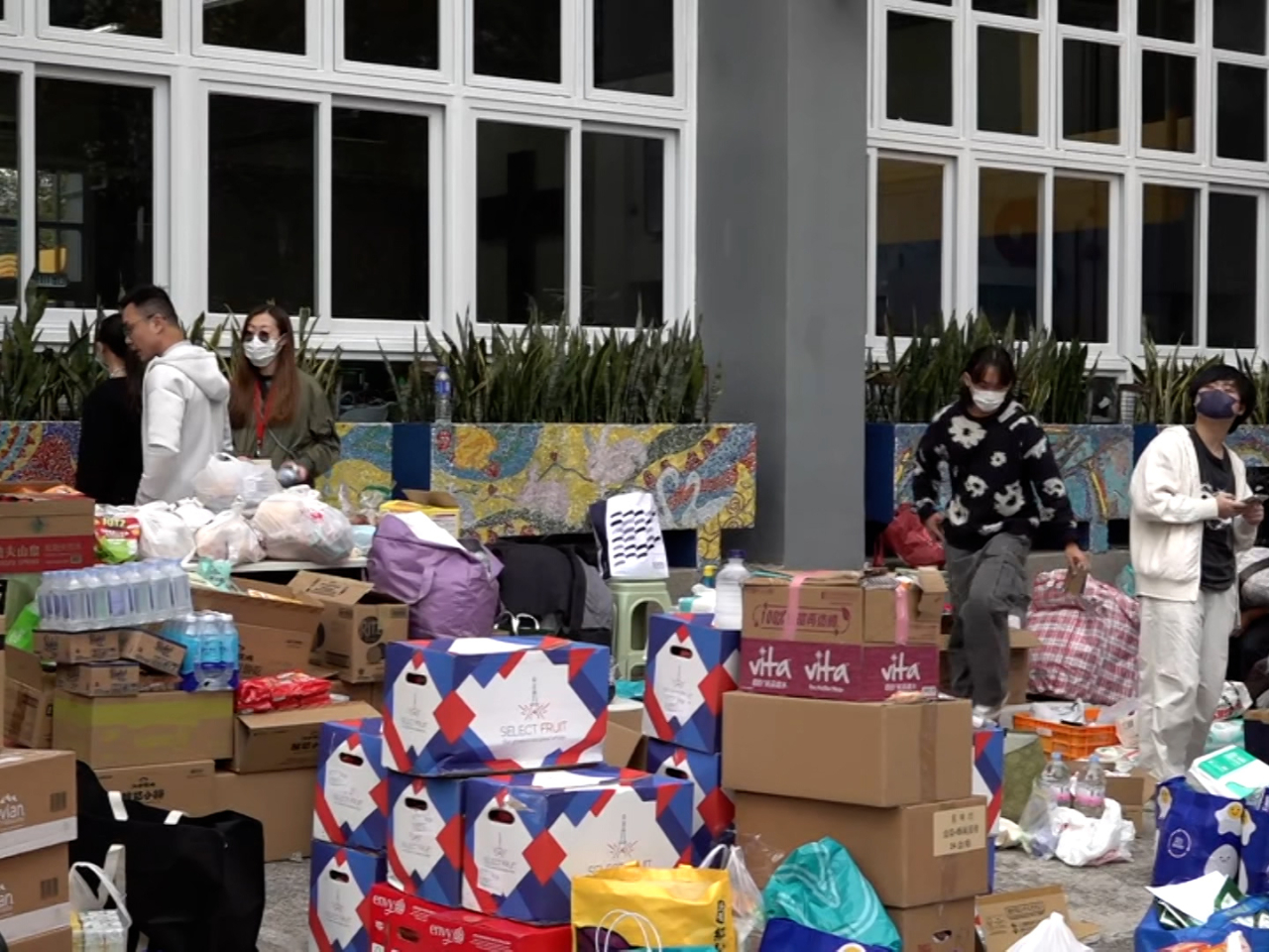 Supplies are distributed to affected residents and rescue personnel. Photo: RTHK