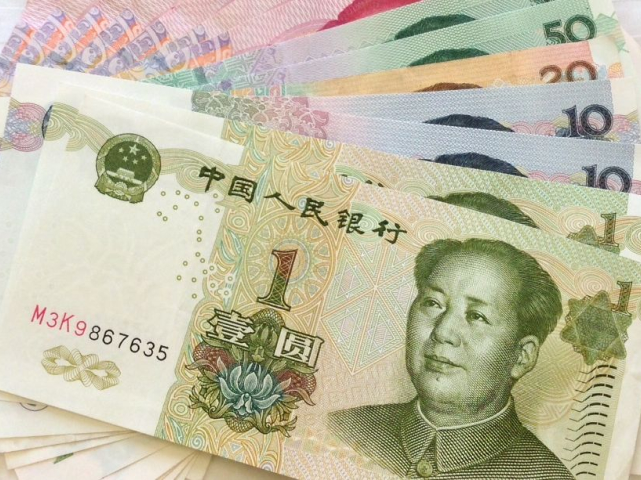 人民幣中間價回軟至7.0789兌1美元，結束5日升勢。（港台圖片）