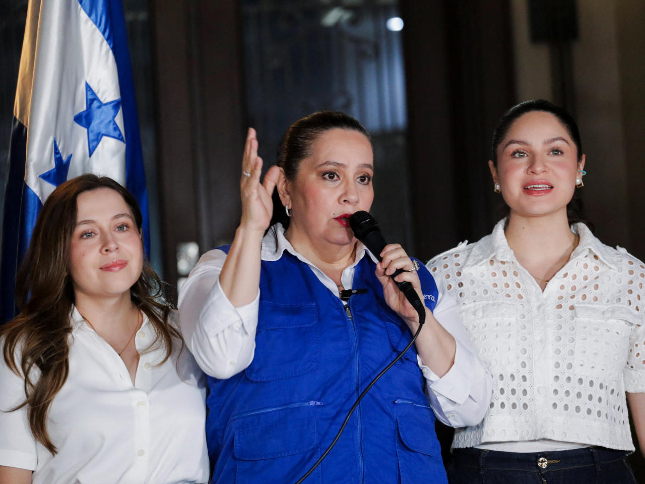 Ana Garcia, wife of former Honduras president Juan Orlando Hernandez, speaks to reporters. Photo: Reuters