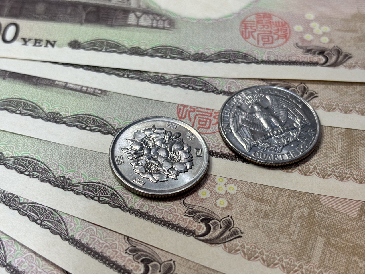 市場認為，植田和男的言論等同提前預告本月加息，加息機率急升至約8成，日圓兌美元或已完成整固。（港台圖片）