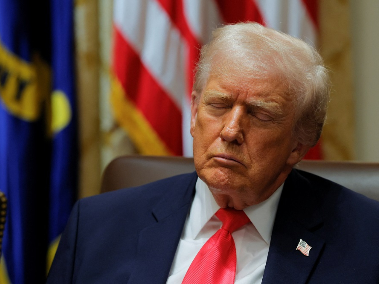 US President Donald Trump appeared to be snoozing during a cabinet meeting on Tuesday. Photo: Reuters