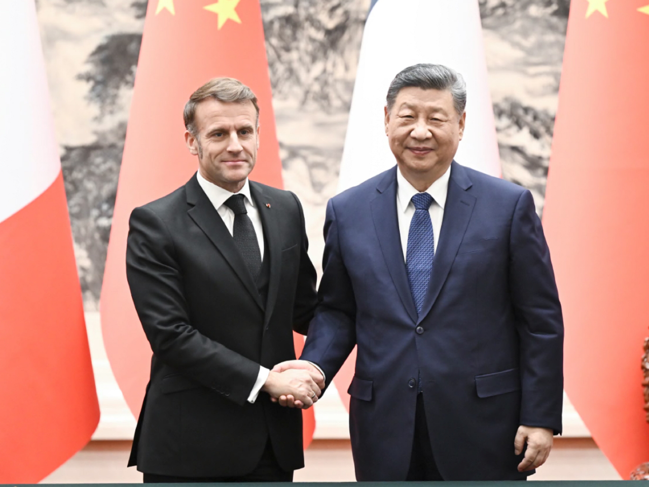 習近平在北京人民大會堂與馬克龍舉行會談。（新華社）