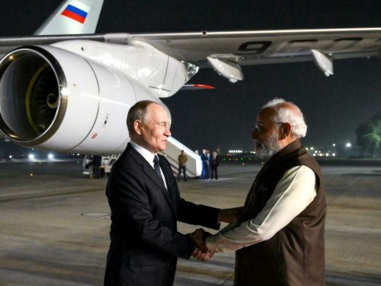 Indian Prime Minister Narendra Modi greets visiting Russian President Vladimir Putin at the airport. Photo: AFP