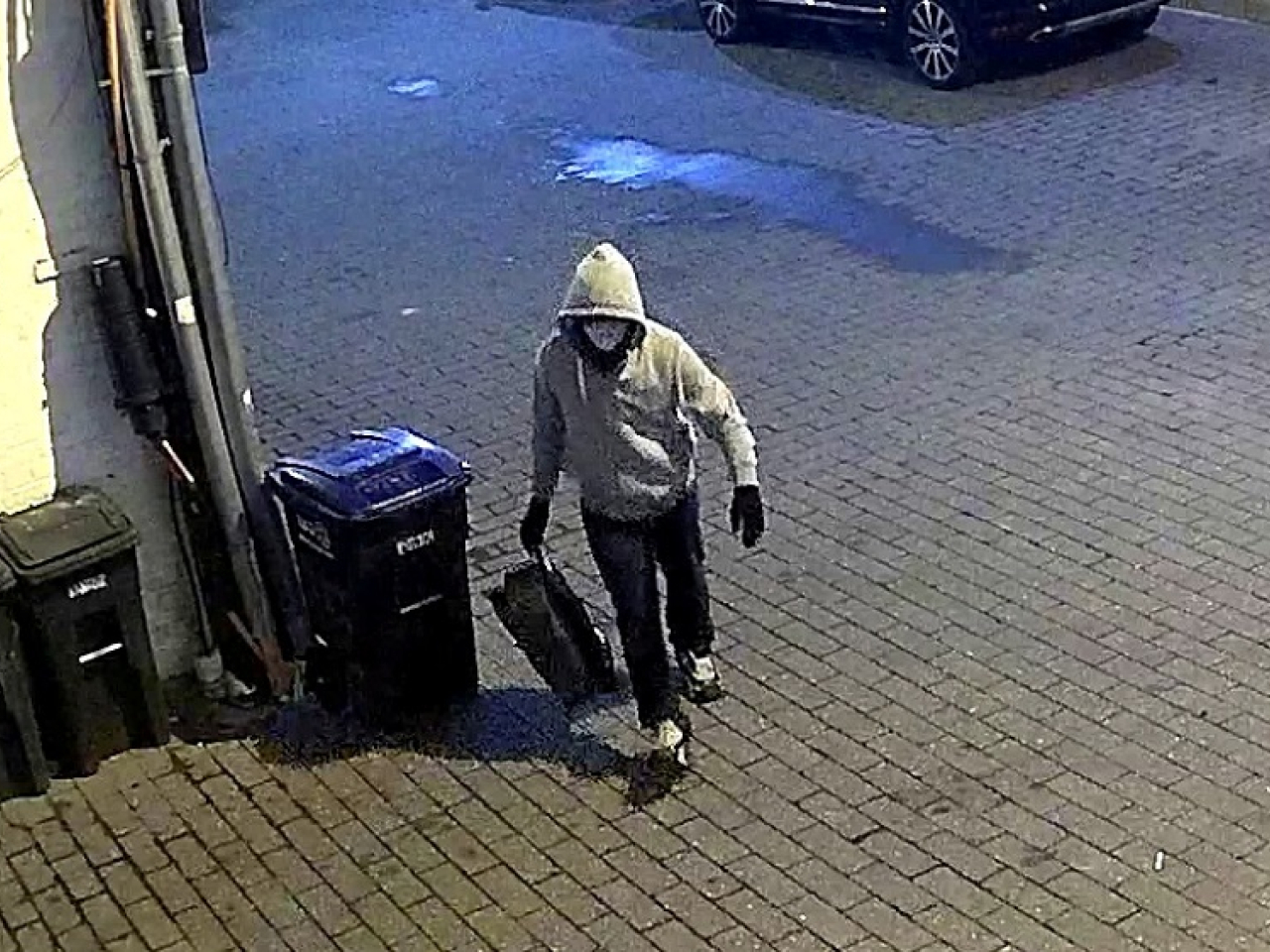 The FBI released numerous photos and video clips of a masked and hooded suspect over the years. Photo: Reuters