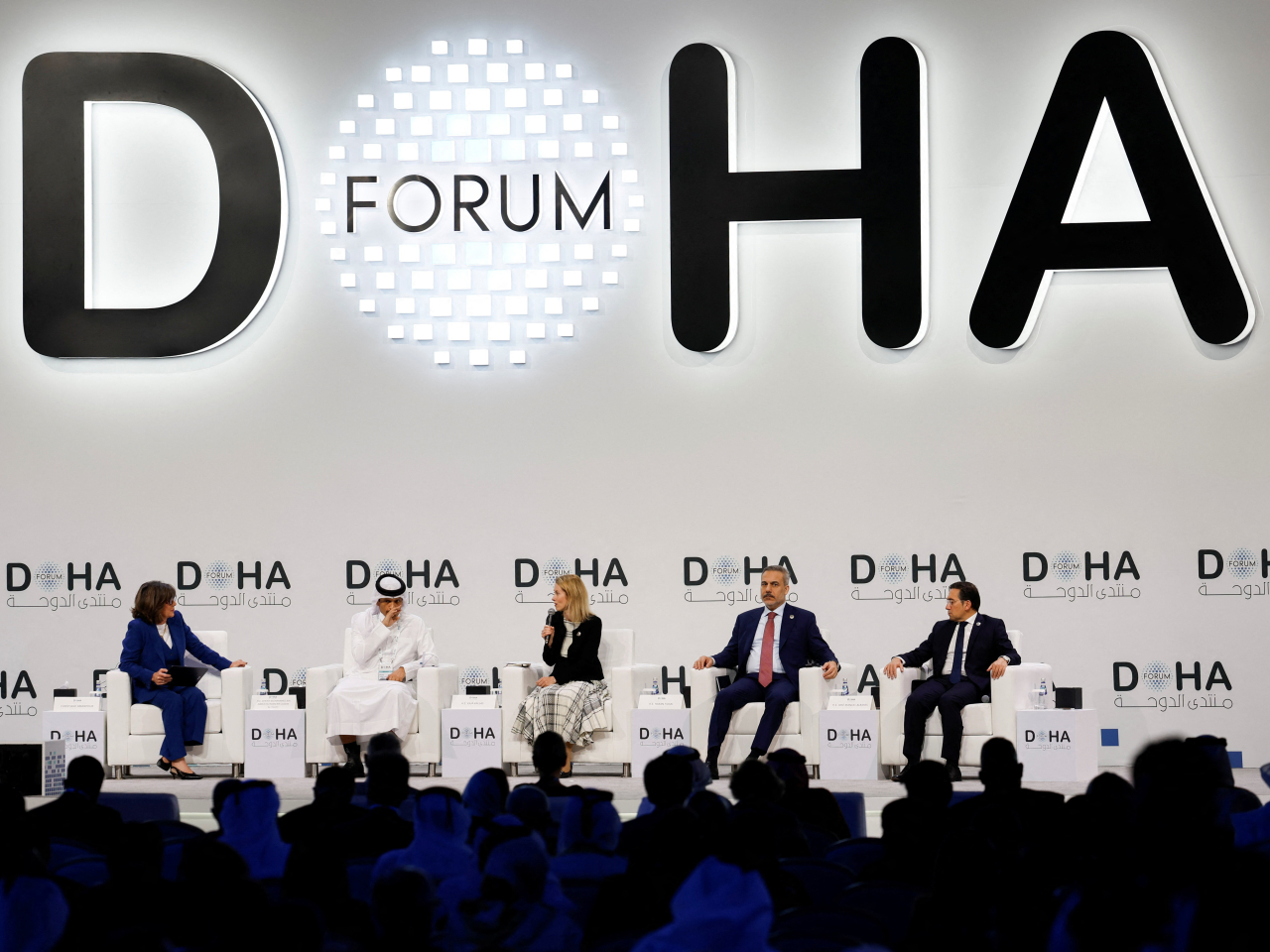 Qatar Prime Minister Sheikh Mohammed bin Abdulrahman bin Jassim Al-Thani, second left, speaks at the Doha Forum. Photo: Reuters