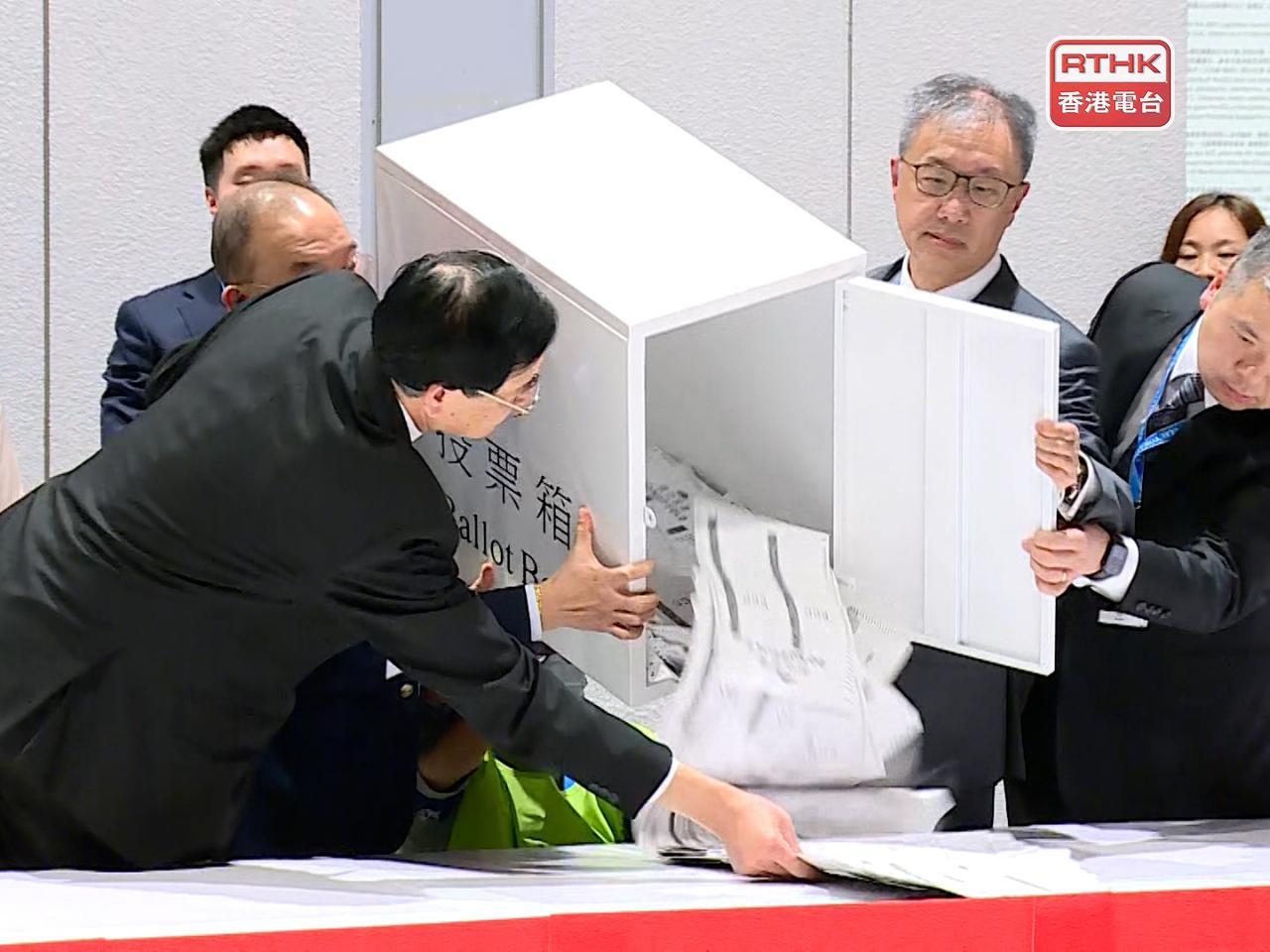 David Lok says the voting process has been smooth and hopes that the remaining results will be announced within hours. Photo: RTHK