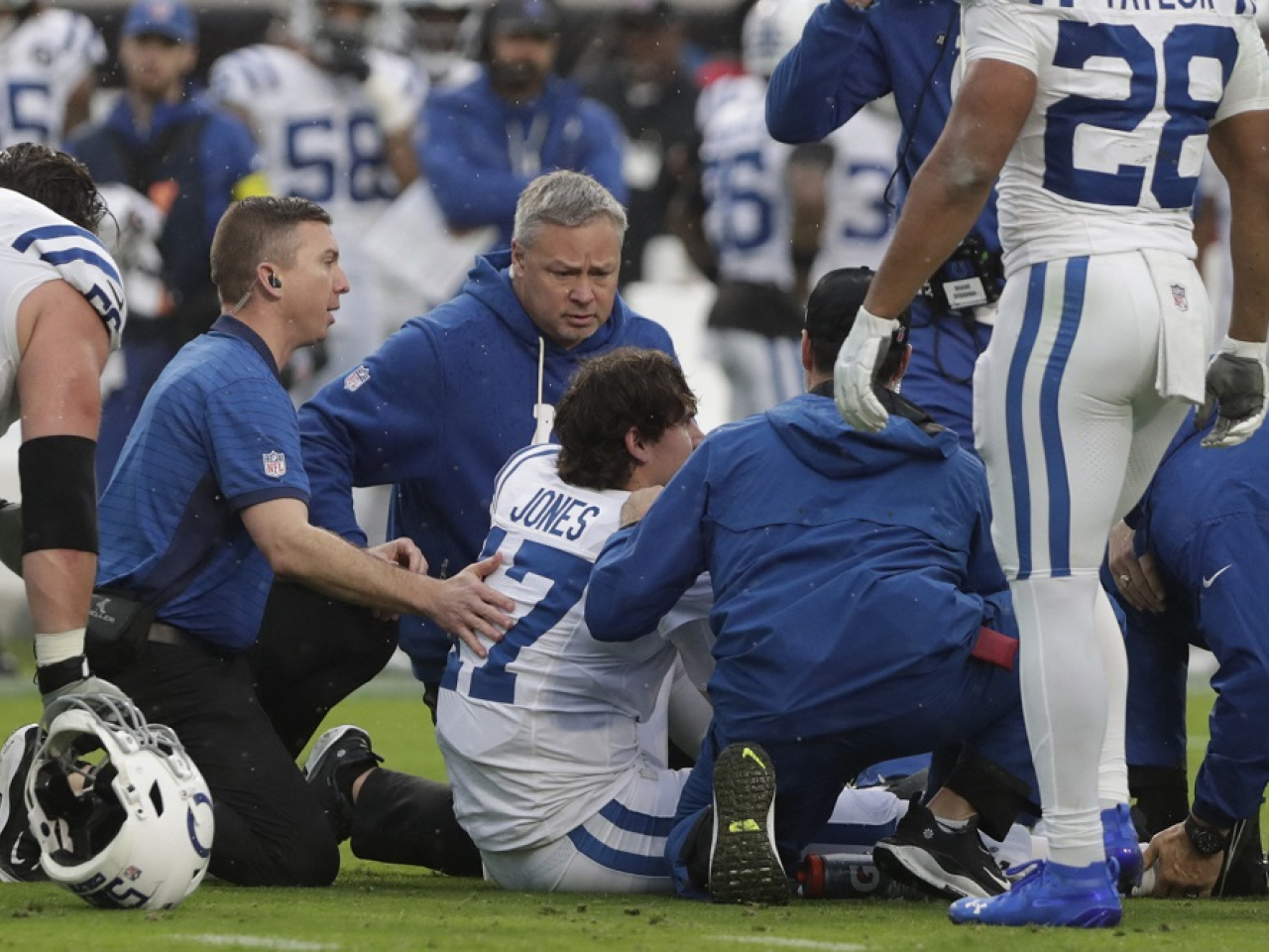 Indianapolis Colts quarterback Daniel Jones is tended to by trainers. Photo: Reuters