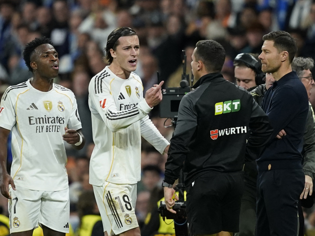 Alvaro Carreras, right, was among the players sent off in Real Madrid's 2-0 defeat to Celta. Photo: Reuters