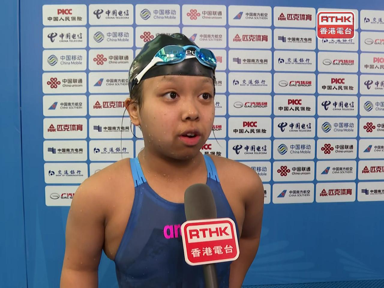 吳卓恩在女子200米個人混合泳SM7決賽，以3分12秒36，與廣東代表並列第三名完成，為港隊增添銅牌。（香港電台）