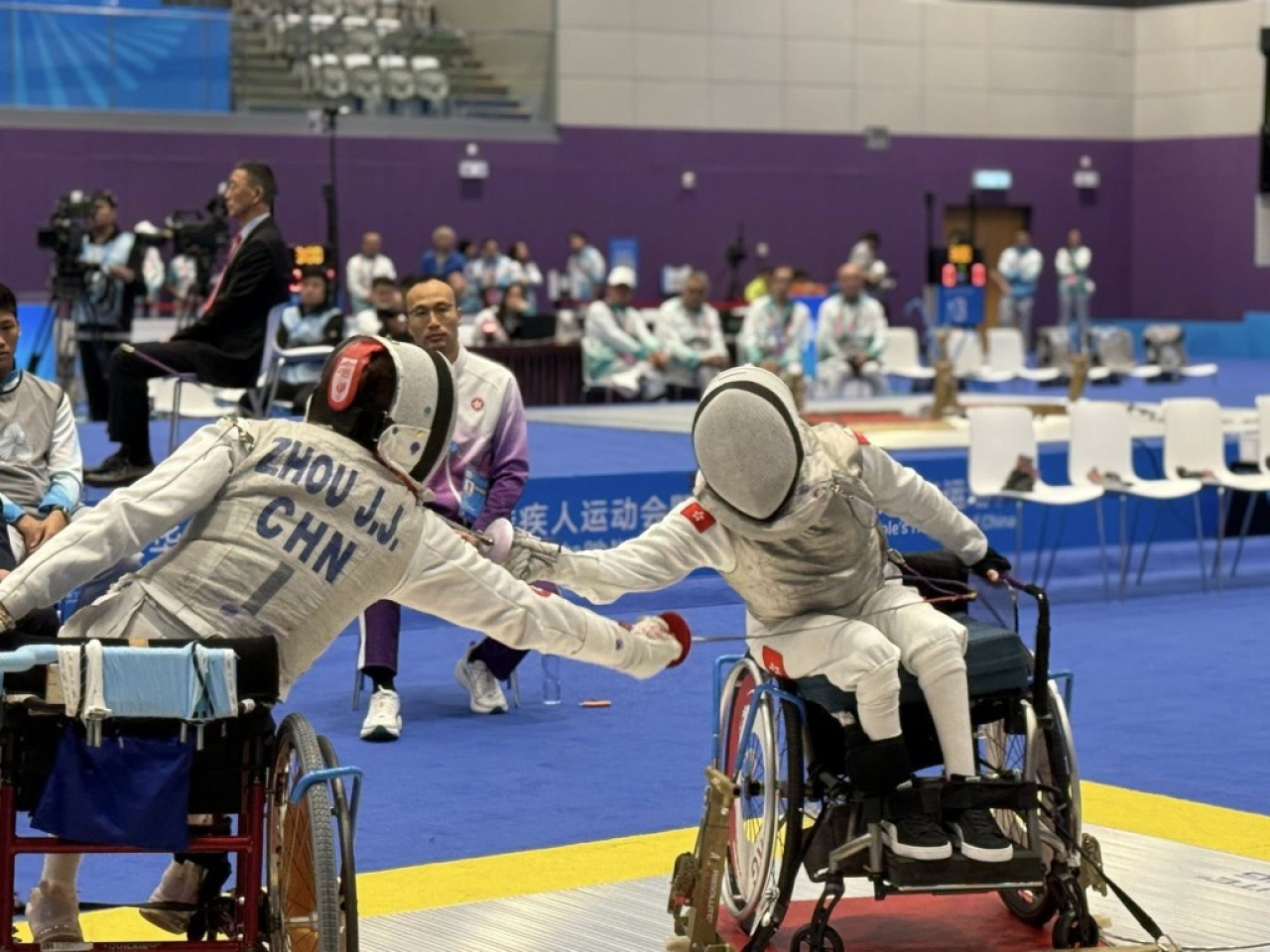 Tong Nga-ting (right) says she's grateful for the support from the home crowd. Photo courtesy of the Sports Association for the Physically Disabled of Hong Kong, China