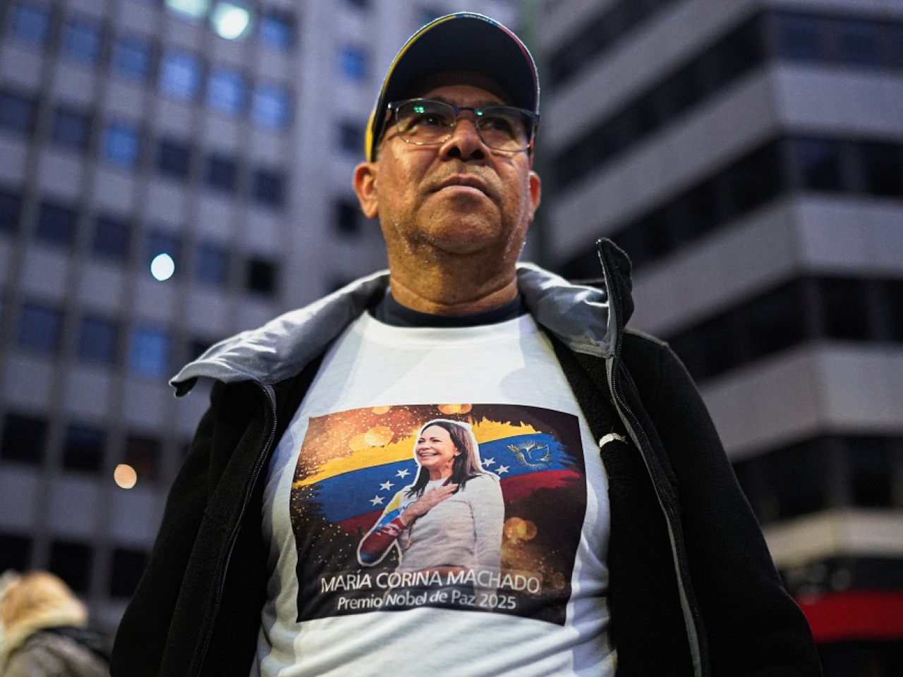 A supporter shows off a t-shirt depicting Venezuelan opposition politician Maria Corina Machado, who has not been seen in public for 11 months. File photo: Reuters